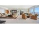 Spacious living room featuring elegant furnishings and panoramic windows at 1233 N Gulfstream Ave # 1001, Sarasota, FL 34236