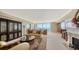 Living room with floor to ceiling windows and water view at 1233 N Gulfstream Ave # 1001, Sarasota, FL 34236