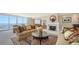 Spacious living room with fireplace and water views at 1233 N Gulfstream Ave # 1001, Sarasota, FL 34236