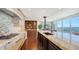 Modern kitchen features granite countertops and custom cabinetry at 1233 N Gulfstream Ave # 1001, Sarasota, FL 34236