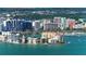 Aerial view of waterfront property with upscale high-rise buildings and marina at 1233 N Gulfstream Ave # 1001, Sarasota, FL 34236