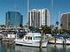 Peaceful marina with boats docked, offering waterfront living at 1233 N Gulfstream Ave # 1001, Sarasota, FL 34236