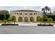 Elegant community building with fountain and manicured landscaping at 6101 34Th W St # 15B, Bradenton, FL 34210