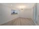 Modern dining room with an open kitchen and a view to the balcony at 6101 34Th W St # 15B, Bradenton, FL 34210