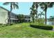 Ground level view of condo building and surrounding landscape at 6101 34Th W St # 15B, Bradenton, FL 34210
