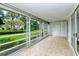 Spacious screened patio with tiled flooring and access to the outdoors at 6101 34Th W St # 15B, Bradenton, FL 34210