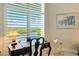 Home office with water views and custom desk at 393 N Point Rd # 801, Osprey, FL 34229
