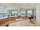 Kitchen with granite countertops, island, and breakfast bar at 393 N Point Rd # 801, Osprey, FL 34229