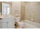 Clean and bright guest bathroom with a tub/shower combination and a single vanity at 393 N Point Rd # 801, Osprey, FL 34229