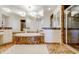 Elegant bathroom with a large soaking tub, double vanity, and a walk-in shower at 393 N Point Rd # 801, Osprey, FL 34229