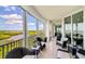 Serene screened balcony boasting water and mangrove views at 393 N Point Rd # 801, Osprey, FL 34229
