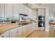 Modern kitchen with granite countertops and stainless steel appliances at 393 N Point Rd # 801, Osprey, FL 34229