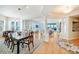Formal dining room with hardwood floors and large table at 393 N Point Rd # 801, Osprey, FL 34229