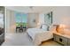 Spacious bedroom with water views and ample natural light at 393 N Point Rd # 801, Osprey, FL 34229