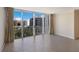 Bright living space with expansive windows and city views at 435 S Gulfstream Ave # 1005, Sarasota, FL 34236