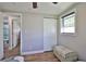 Bedroom with a view of the bathroom and a built-in storage bench at 1007 27Th Street E Ct, Bradenton, FL 34208