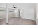 Open bedroom with durable flooring, large closet, and light filled window for maximum comfort at 1012 Myrtle Ave, Venice, FL 34285