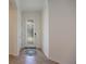 Bright entryway with tile flooring and glass-paned front door at 10141 Fiddlewood Dr, Venice, FL 34293