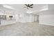Modern kitchen with white cabinets, granite countertops, and a large island at 11213 Gulfstream Blvd, Port Charlotte, FL 33981