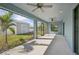 Covered screened porch, offering a shaded outdoor space at 11213 Gulfstream Blvd, Port Charlotte, FL 33981