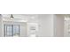 Bright hallway with access to the backyard and kitchen at 11213 Gulfstream Blvd, Port Charlotte, FL 33981