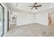 Main bedroom with access to bathroom and kitchen at 11213 Gulfstream Blvd, Port Charlotte, FL 33981