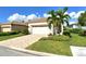 Single-story house with a two-car garage and brick paver driveway at 3924 Alamanda Dr, Sarasota, FL 34238