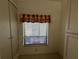 Window with blinds allowing natural light to come through at 7234 Cloister Dr # 7234, Sarasota, FL 34231