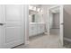 Bathroom with single vanity and view of another room at 2630 Beeville Ave, North Port, FL 34286