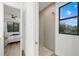 Modern bathroom with glass shower and view at 577 Venice Ln, Sarasota, FL 34242