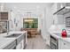 Bright kitchen with an island, dining area, and modern finishes at 577 Venice Ln, Sarasota, FL 34242
