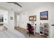 Spacious bedroom with hardwood floors, desk, and a basketball hoop at 577 Venice Ln, Sarasota, FL 34242