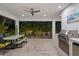 Modern outdoor kitchen with dining area and built-in grill at 577 Venice Ln, Sarasota, FL 34242