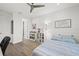 bedroom with hardwood floors and ceiling fan at 577 Venice Ln, Sarasota, FL 34242