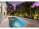 Inviting rectangular swimming pool with surrounding patio at 577 Venice Ln, Sarasota, FL 34242