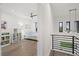 Bright bedroom with built-in shelving and hardwood floors at 577 Venice Ln, Sarasota, FL 34242