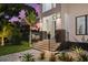 Modern house entrance with stone accents and a landscaped walkway at 577 Venice Ln, Sarasota, FL 34242