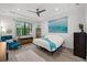 Spacious bedroom with a large bed and sitting area at 577 Venice Ln, Sarasota, FL 34242