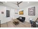 Multipurpose bedroom with couch, work area, and en-suite bathroom at 577 Venice Ln, Sarasota, FL 34242