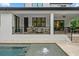 Covered patio with seating area and pool views at 577 Venice Ln, Sarasota, FL 34242