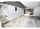 Small patio adjacent to the villa, ideal for relaxing at 3961 Ashwood Ln # 44, Sarasota, FL 34232