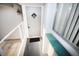 Inviting front entrance with a keypad door lock and small patio at 3961 Ashwood Ln # 44, Sarasota, FL 34232