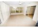 Sunroom with tile flooring and access to the outdoors at 3961 Ashwood Ln # 44, Sarasota, FL 34232