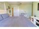 Bedroom with a king-size bed, a desk and a neutral color scheme at 8926 Shadyside Ln, Land O Lakes, FL 34637