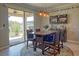 Kitchen dining area with sliding glass doors leading to backyard at 8926 Shadyside Ln, Land O Lakes, FL 34637