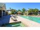 Resort-style pool with spa and lounge area at 6527 Moorings Point Cir # 101, Lakewood Ranch, FL 34202