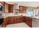 Kitchen with stainless steel appliances and granite countertops at 6527 Moorings Point Cir # 101, Lakewood Ranch, FL 34202