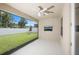 Screened porch overlooking a grassy backyard with a privacy fence at 2471 W Price Blvd, North Port, FL 34286
