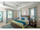 Spacious main bedroom with a king-size bed and stylish decor at 2471 W Price Blvd, North Port, FL 34286