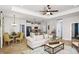 Open concept living area with a view into the kitchen and dining area at 2471 W Price Blvd, North Port, FL 34286